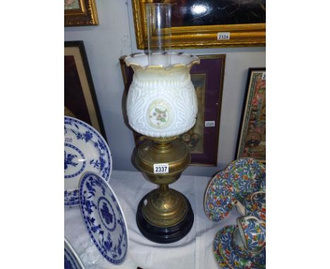 A Victorian brass oil lamp with later shade, COLLECT ONLY.