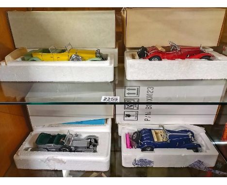 Four Franklin Mint 1/24 Scale. 2 x Mercedes 500tc, Gary Cooper Duesenberg and Rolls Royce Ghost in boxes with paperwork. 