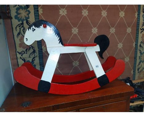 A vintage painted wooden rocking horse Length 85cm, height 56cm, seat height 38cm,&nbsp;COLLECT ONLY.