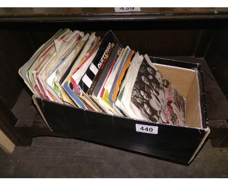 A collection of 45 RPM 12" singles including Rolling Stones etc.