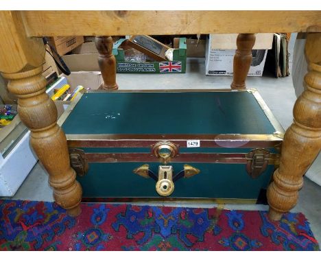 A green faux leather? Travel trunk with metal edges and contents etc. COLLECT ONLY.