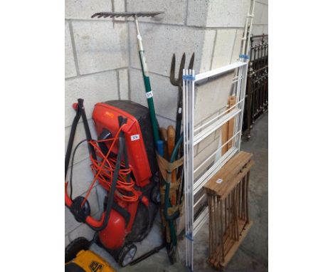A quantity of garden tools.