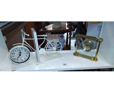 Vintage style bicycle clock bookends and a brass framed London quartz clock 