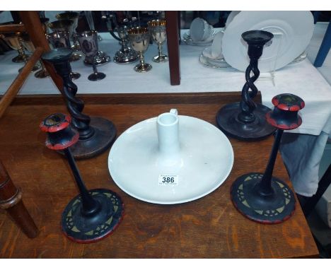 A pair of barley twist oak candlesticks. A Pair of painted wood candlesticks and a large Ikea chamber stick.