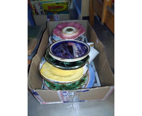 A large box of collector and vintage plates.