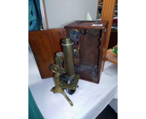 A cased brass microscope, COLLECT ONLY 