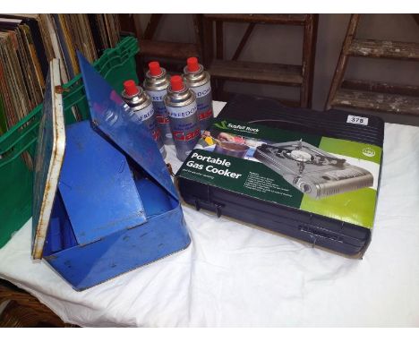 A Vintage camping Gas Deluxe super Bleuet stove and modern portable gas cooker with four canisters.&nbsp;COLLECT ONLY.