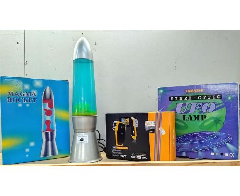 A boxed Magma rocket lamp, a boxed Tamashi UFO lamp &amp; boxed under water digital video recorder.&nbsp;COLLECT ONLY.