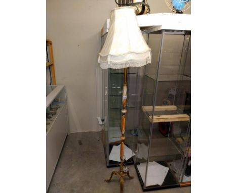 A standard lamp with shade. A/F.