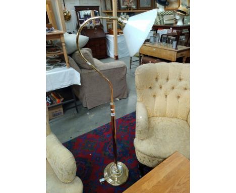 A swan neck brass standard lamp. Height 140cm. COLLECT ONLY.