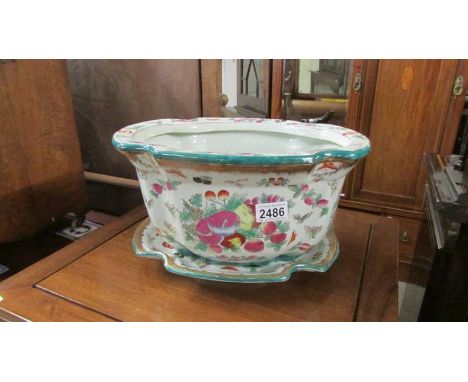 A Chinese United Wilson 1897 planter decorated with insects and fruit and a meat platter, COLLECT ONLY.