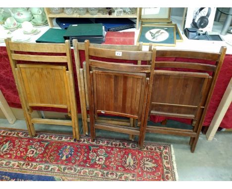 Four vintage folding chairs