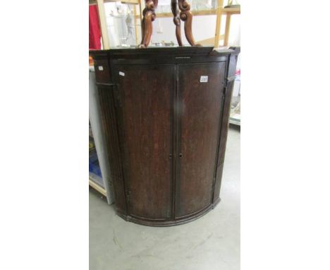 A Victorian oak bow front corner cupboard, COLLECT ONLY.&nbsp; 76 X 53 X 1O1 cm high,