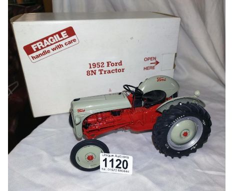 A Danbury mint Ford 8N tractor with box. No certificate. 