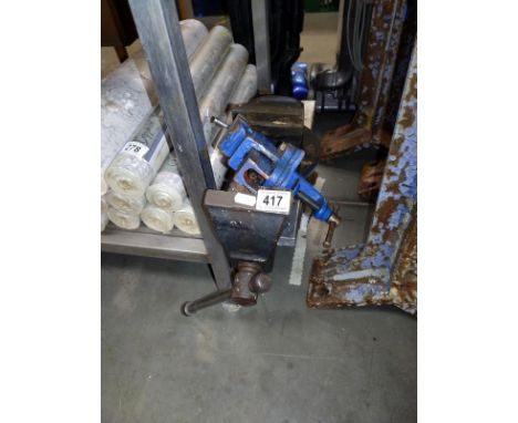 A medium sized bench vice and a small clamped vice.