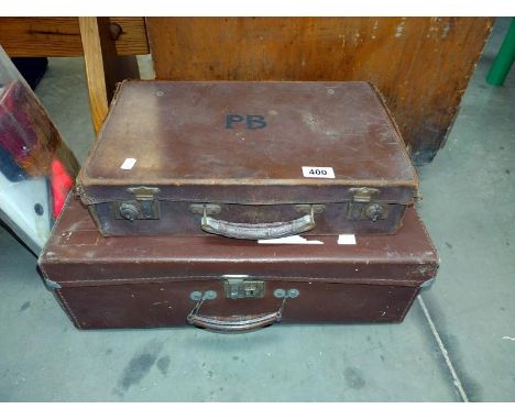 Two vintage suitcases.