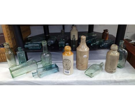 A quantity of vintage bottles including stoneware Lincoln ginger beer bottles 