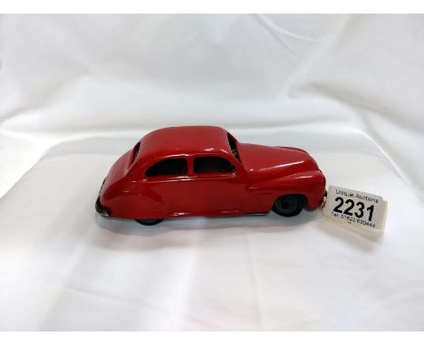 A Chad Valley tin plate clockwork car, works when tested but missing key 