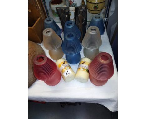 A selection of colourful glass tea light lamps plus a pair of artistic candle holders and 2 candles,&nbsp;COLLECT ONLY.