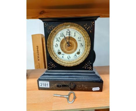A Victorian black enamelled cast iron Mantle clock. 24cm x 12cm x Height 26cm. Springs ok but wound to the limit.&nbsp;&nbsp;