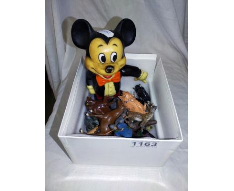A vintage Mickey Mouse money box and a quantity of Britain's Lead farm animals and people. 