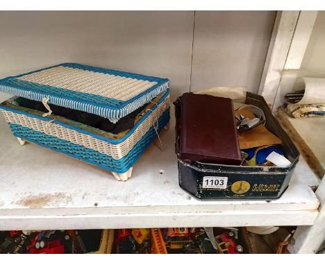 A vintage sewing box and contents including cotton reels and wool, and a tin and contents including vintage hair clips 