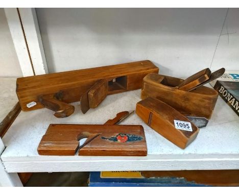 Four vintage wooden carpenters planes. 