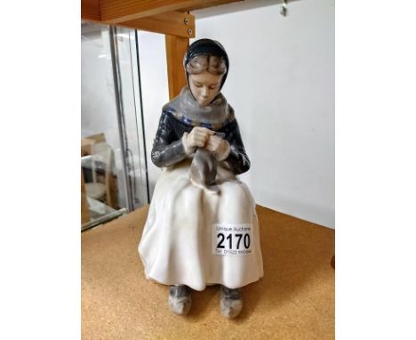 A large Royal Copenhagen figurine of a seated lady 