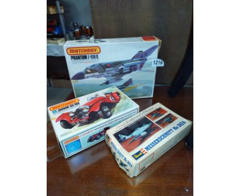 A Matchbox Jaguar SS100, phantom F-4 M/K and Revell Messerschmitt ME 262A model kits looks unstarted not checked for completi