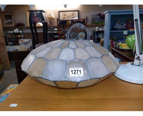 A vintage leaded and celluloid/ plastic flying saucer shape lamp shade. D 39cm x 19cm.