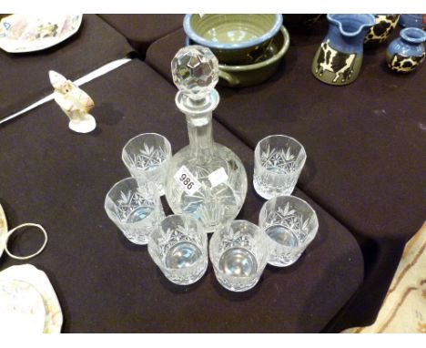 CRYSTAL GLASSWARE. Sterling crystal decanter and set of six matching whisky glasses 