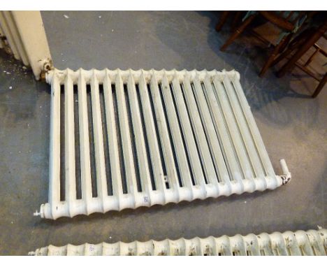 CAST IRON RADIATOR. Antique painted cast iron school seventeen vane radiator, L: 130 cm