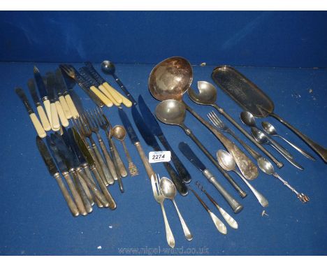 A quantity of plated and metal cutlery including dessert knives and forks, large ladle, salad servers, teaspoons etc.