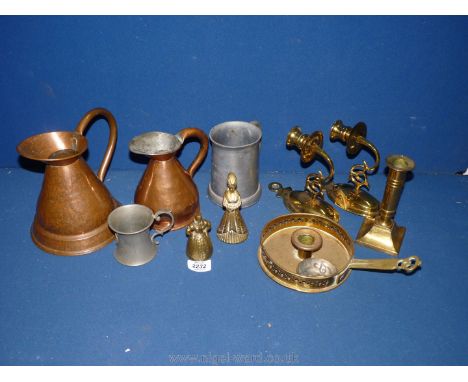 A quantity of brass, copper and pewter including ale jugs, wall candle sconces, chamber stick, tankard set etc.