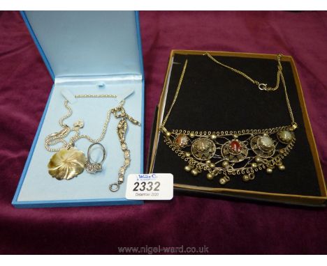 A small quantity of Sterling Silver items to include a necklace with a Mother of Pearl pendant in the shape of a flower, a sm