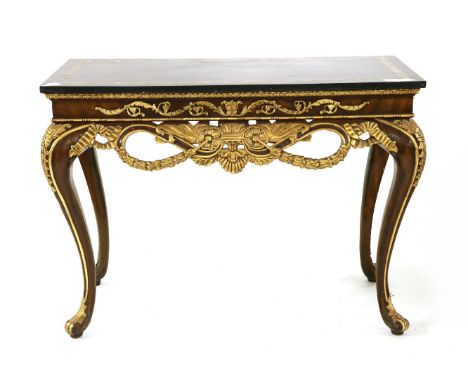 A marble topped parcel gilt mahogany console table, by Maitland-Smith, with profusely carved frieze, on cabriole legs, 110cm 