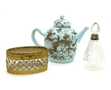 A Chinese turquoise glazed teapot, a silver collared scent bottle and a gilt metal and glass casket