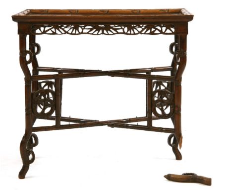 A Chinese padoukwood silver table, the lipped rectangular top raised on square section supports, united by stretchers