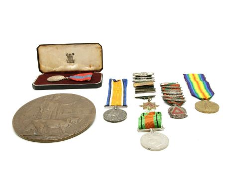 A First World War medal group awarded to John Rowley, comprising of a Victory medal and the British War Medal 1914-1918, toge