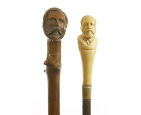 A novelty hazel walking stick, the terminal carved with Dr Livingstone's mask (I presume) , c.1850, and an ivory and briar wa