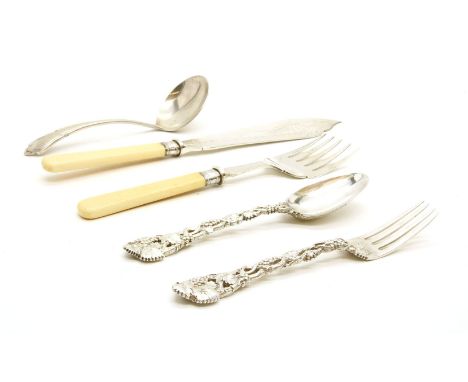 A Victorian spoon and fork, London 1867, with ornately cast fruiting vine handles, a gateau fork and slice, Sheffield 1907, w
