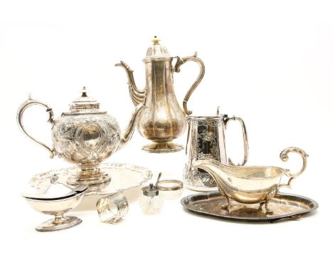 A pair of Sheffield plated candlesticks, a salver, coffee pot, tea pot, a pair of plated coasters, a Victorian silver plated 