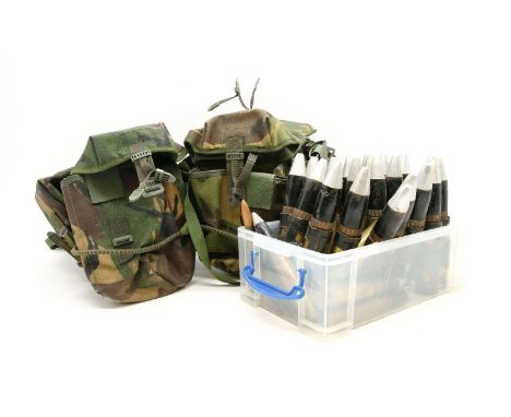 Approximately 22 rounds of light artillery shells, and a modern Army webbing pack