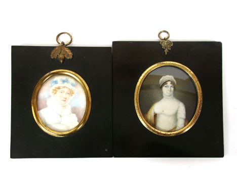 Two portrait miniatures, in ebonised frames, one titled Mary Gramp (née Baker) verso, and signed J Moore 1821