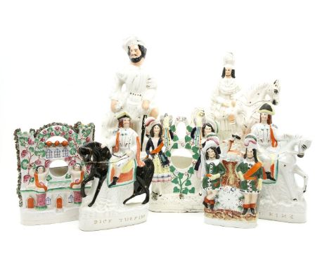Victorian Staffordshire figures, two Scottish gentlemen, Dick Turpin and Tom King, and three clock groups (7)Provenance: Ribe