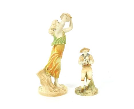 A Hadley's Royal Worcester figure of a young woman playing a tambourine, together with a Hadley's figure of a young man playi