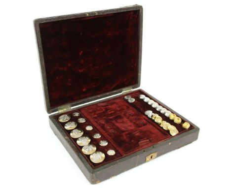 A Regency leather covered and push fitted button box, c.1820, enclosing a variety of buttons, including thistle mounted examp
