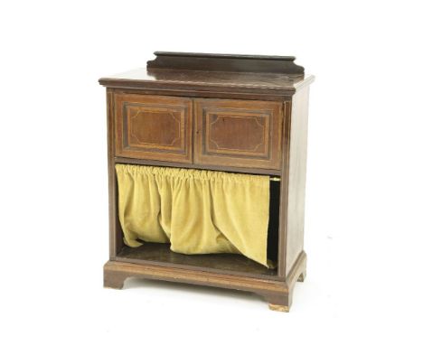 An Edwardian inlaid mahogany dwarf cabinet, having pair of cupboard doors above open shelf on bracket feet, 70cm wide, 36cm d