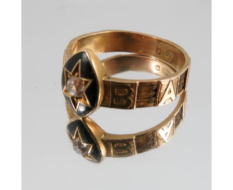 A late Victorian mourning ring, the hair inlaid shank spelling the name Barbara to a black enamel navette shaped head, in bla