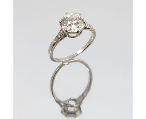 An early 20th century, single stone old brilliant cut diamond hand constructed ring, all precious white metal (tested and val